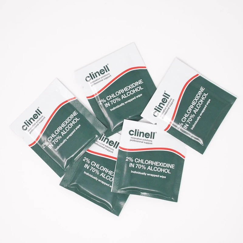 Several sealed green Clinell sachets of 2% chlorhexidine in 70% alcohol wipes