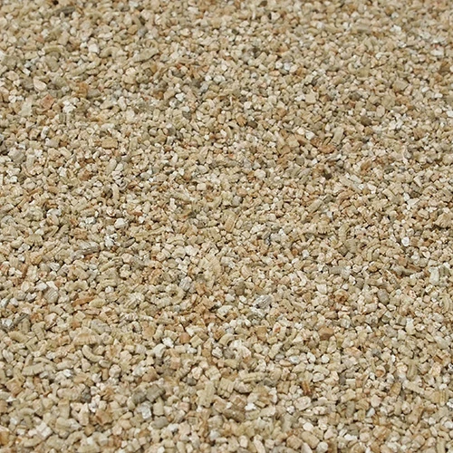 Fine grade vermiculite: small pale gold mineral flakes, finer than the medium grade