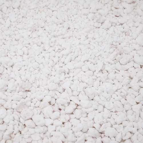 Perlite: irregular chalky white granules of expanded volcanic glass