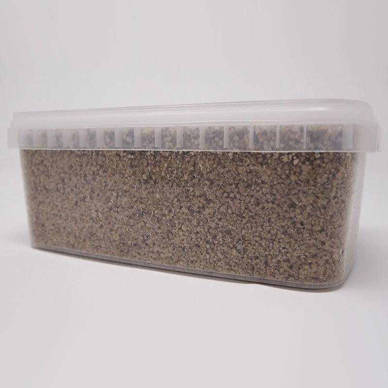 XL PF-Tek Mushroom Grow Kit from the side, showing the depth of packed brown substrate through the clear tub wall
