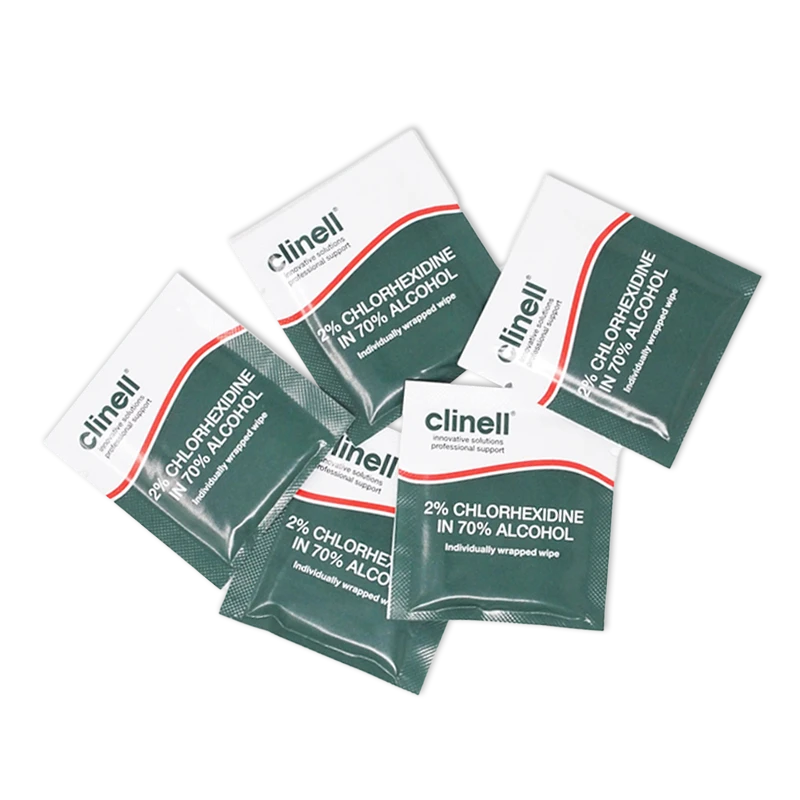 Six sealed Clinell chlorhexidine alcohol wipe sachets arranged on black